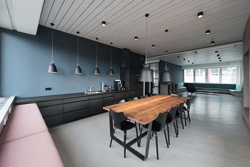 conference room room with pendant lamps and rectangular dining set meeting room